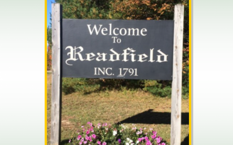 town report cover with the welcome to readfield sign